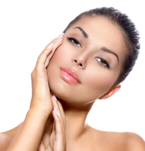 Face of Young Woman with Clean Fresh Skin over White